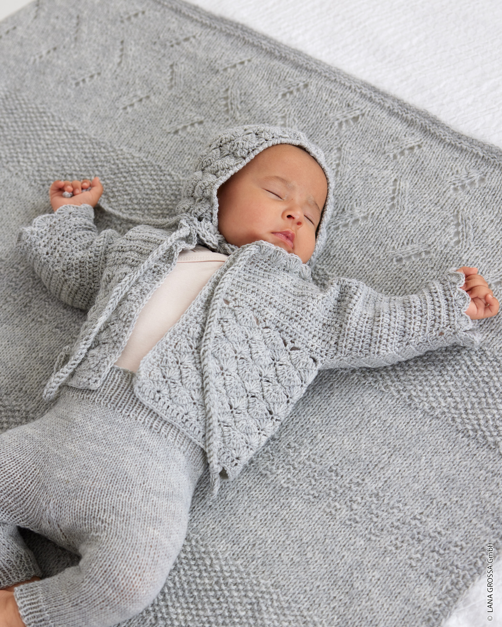Strickset Häkeljäckchen Mit Muschelmuster Aus Cool Wool Baby Von Lana Grossa 1 Häkeljäckchen Mit Muschelmuster - Cool Wool Baby